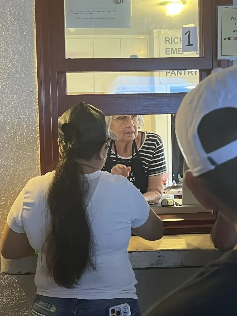 Client being served at window