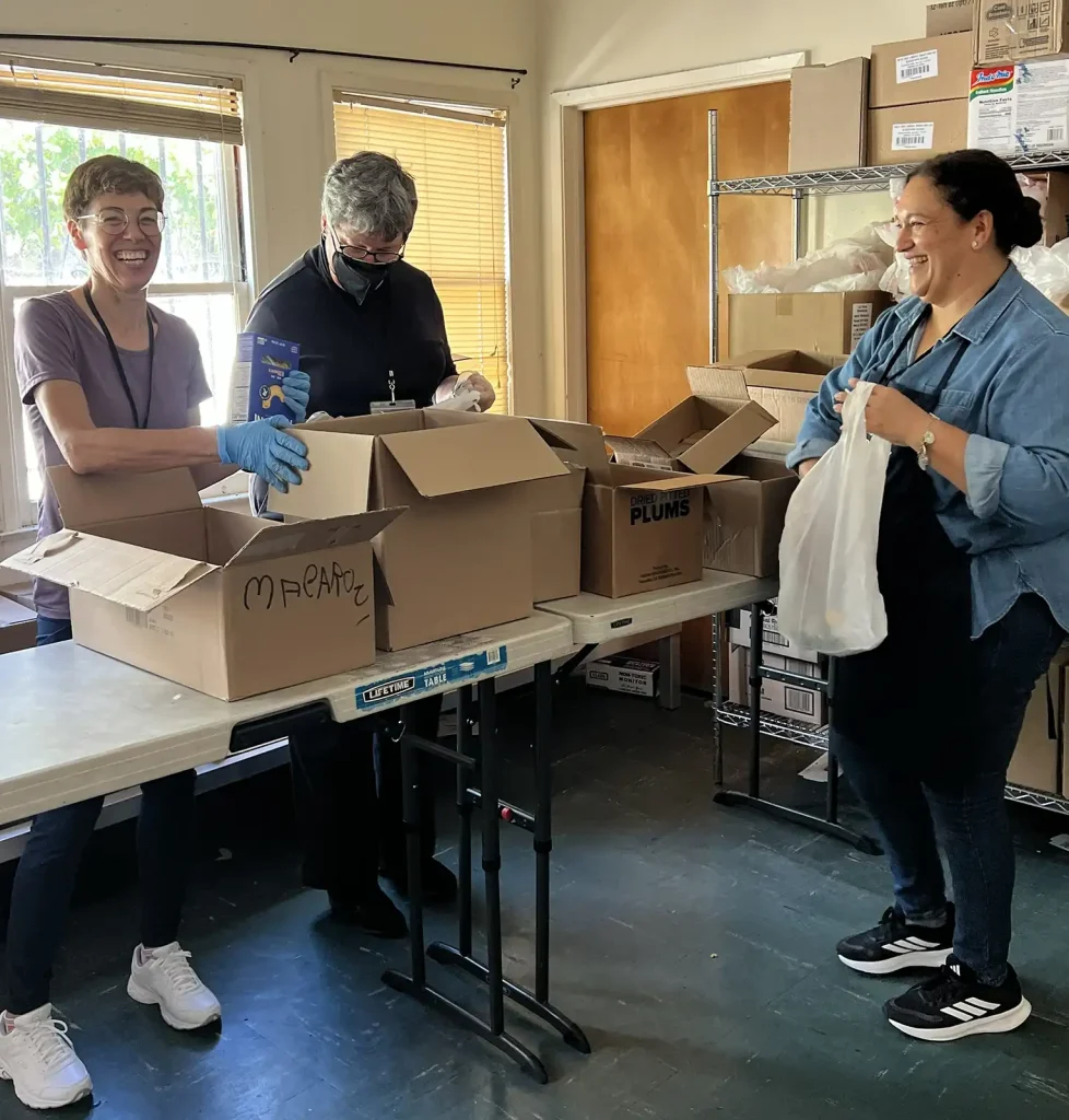 Volunteers packing boxes